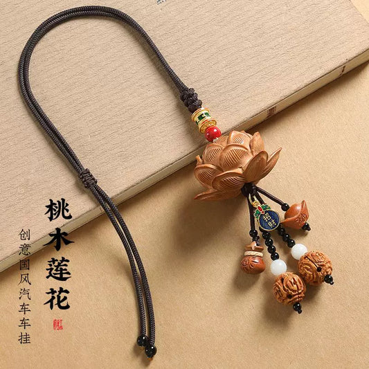 Luxury Peach Wood Car Charm - Handcarved Lotus with Heart Sutra Engraving (Feng Shui Safe Travel Pendant for Luxury Cars)